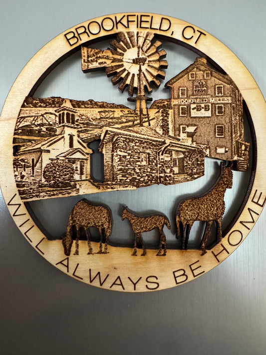 Brookfield, CT refrigerator magnet featuring Brookfield Mills, a windmill, historic buildings, and grazing animals.