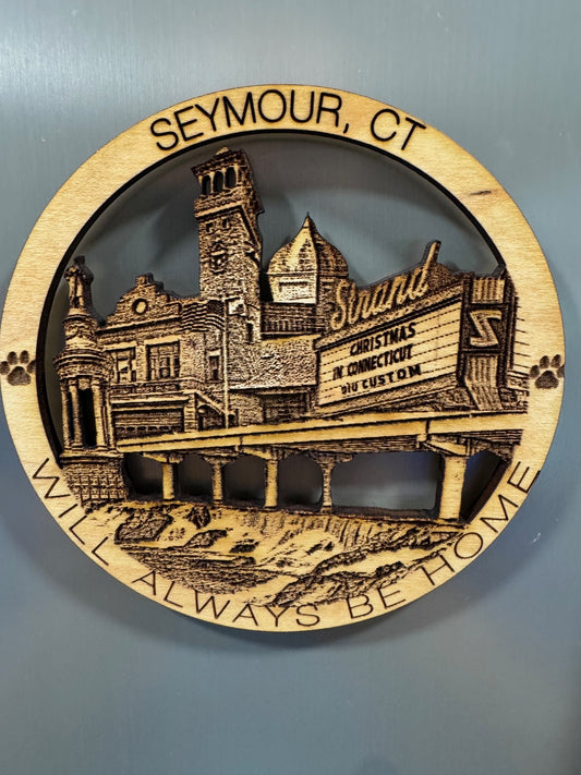 Seymour, CT refrigerator magnet featuring the Strand theater, historic buildings, a bridge, and waterfall.