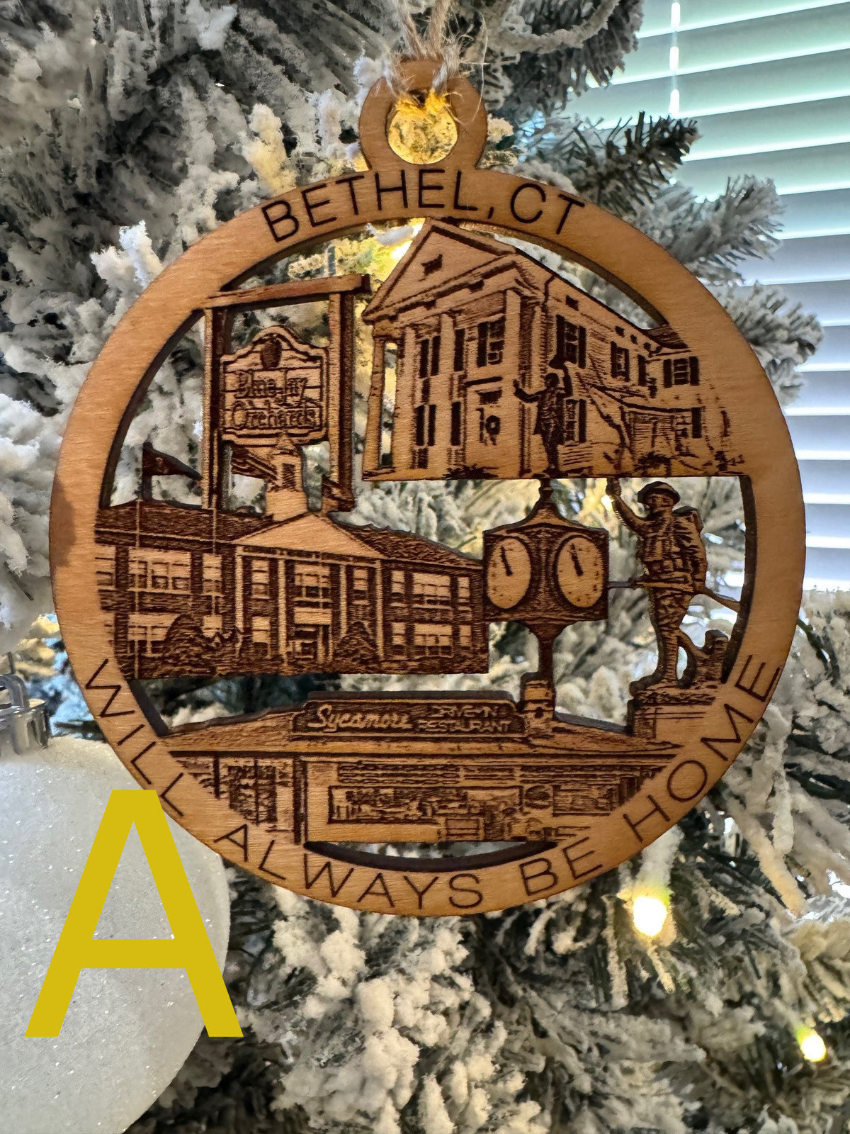 Bethel, CT wooden hometown ornament, design A, hanging on a Christmas tree