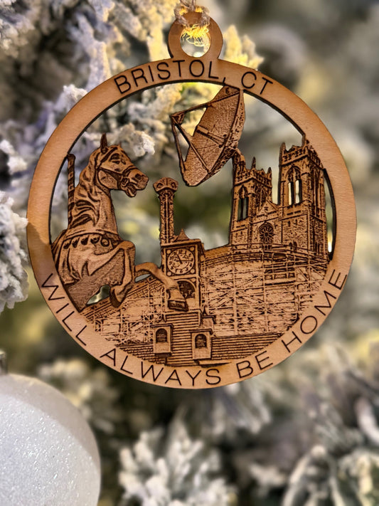 Bristol, CT Christmas ornament featuring a lake compounce carousel horse, espn dish, St. Joseph's church, clock tower