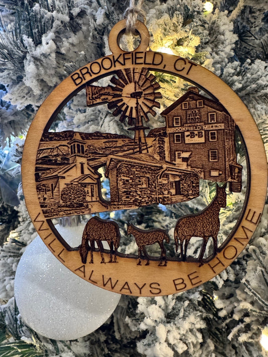 Brookfield, CT Christmas ornament featuring Brookfield Mills, a windmill, historic buildings, and grazing animals.