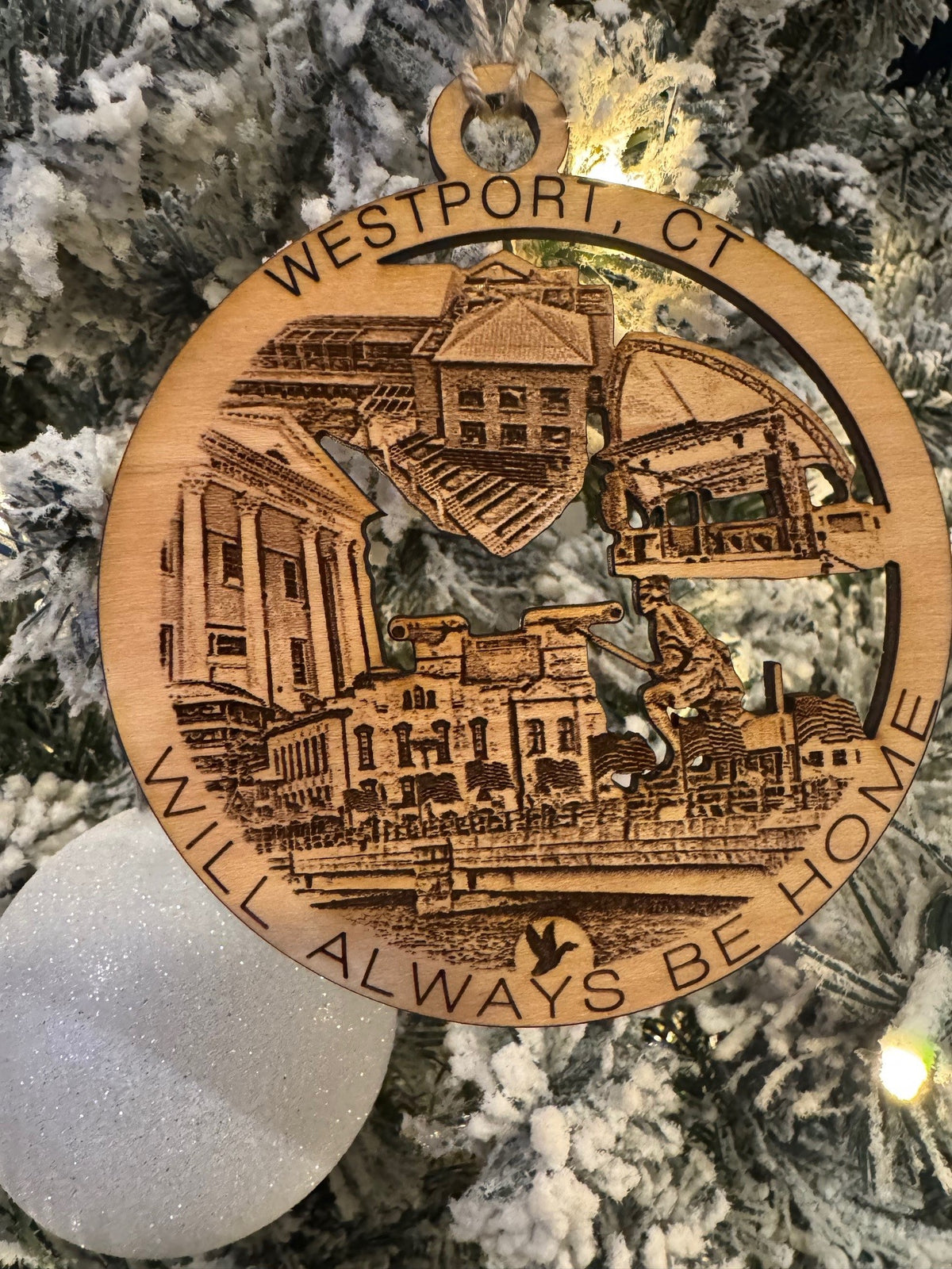 Westport, CT wooden Christmas ornament featuring local landmarks and “Will Always Be Home” engraving.