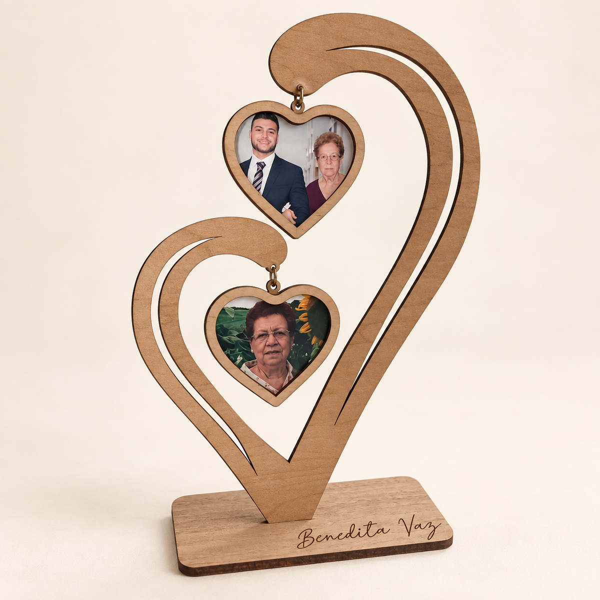 Wooden memorial heart with two hanging family photo frames and a personalized engraved base for grandma