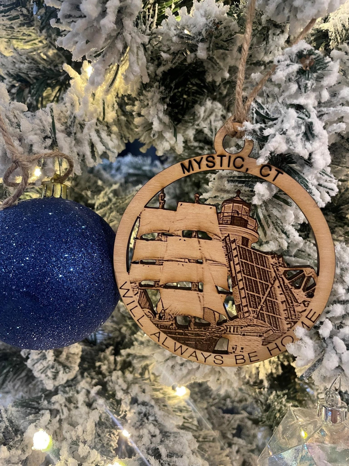 Mystic, CT maple wood Christmas ornament featuring Mystic Seaport, the Bascule Bridge, and coastal landmarks — handcrafted Connecticut hometown keepsake