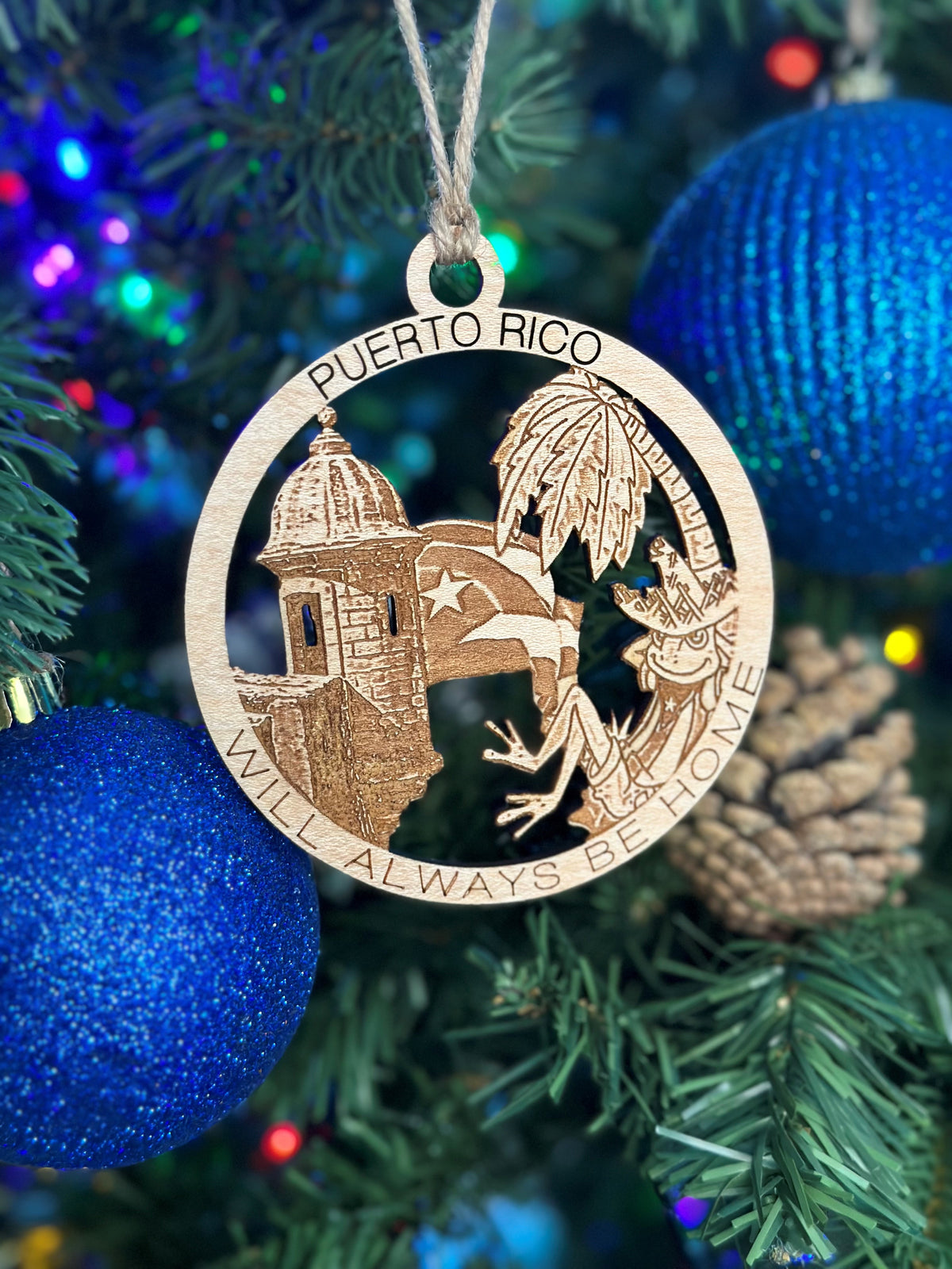 Puerto Rico  ornament featuring engraved landmarks and “Will Always Be Home” lettering.