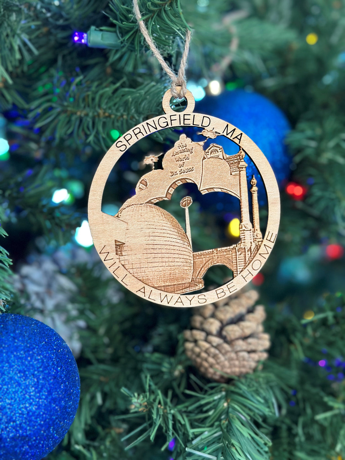 Springfield, MA Christmas ornament featuring local landmarks and “Will Always Be Home” engraving.